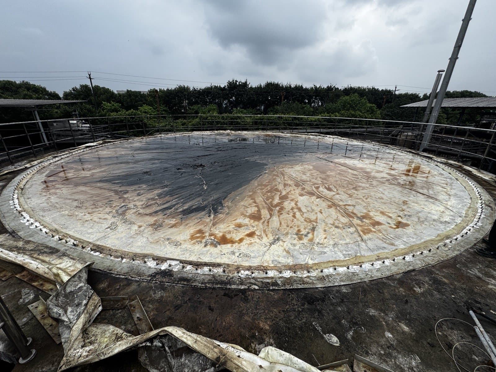 Contaminated base membrane exposed after removal of the old inner membrane